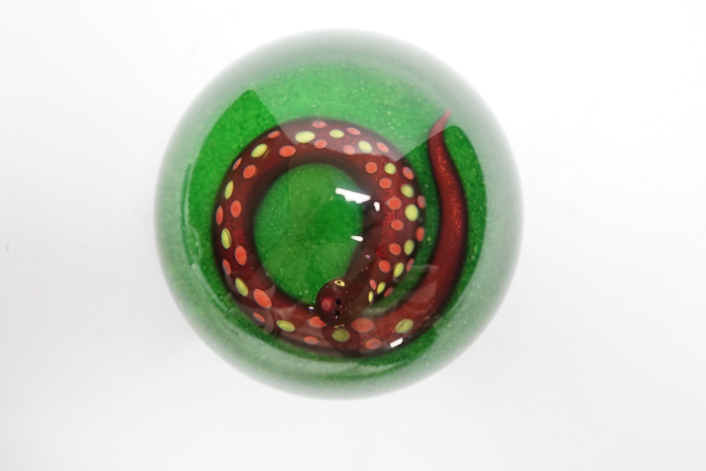 A Paul Ysart ‘aventurine snake’ glass paperweight, Harland period, ‘PY’ cane beneath, green opaque ground, 7cm